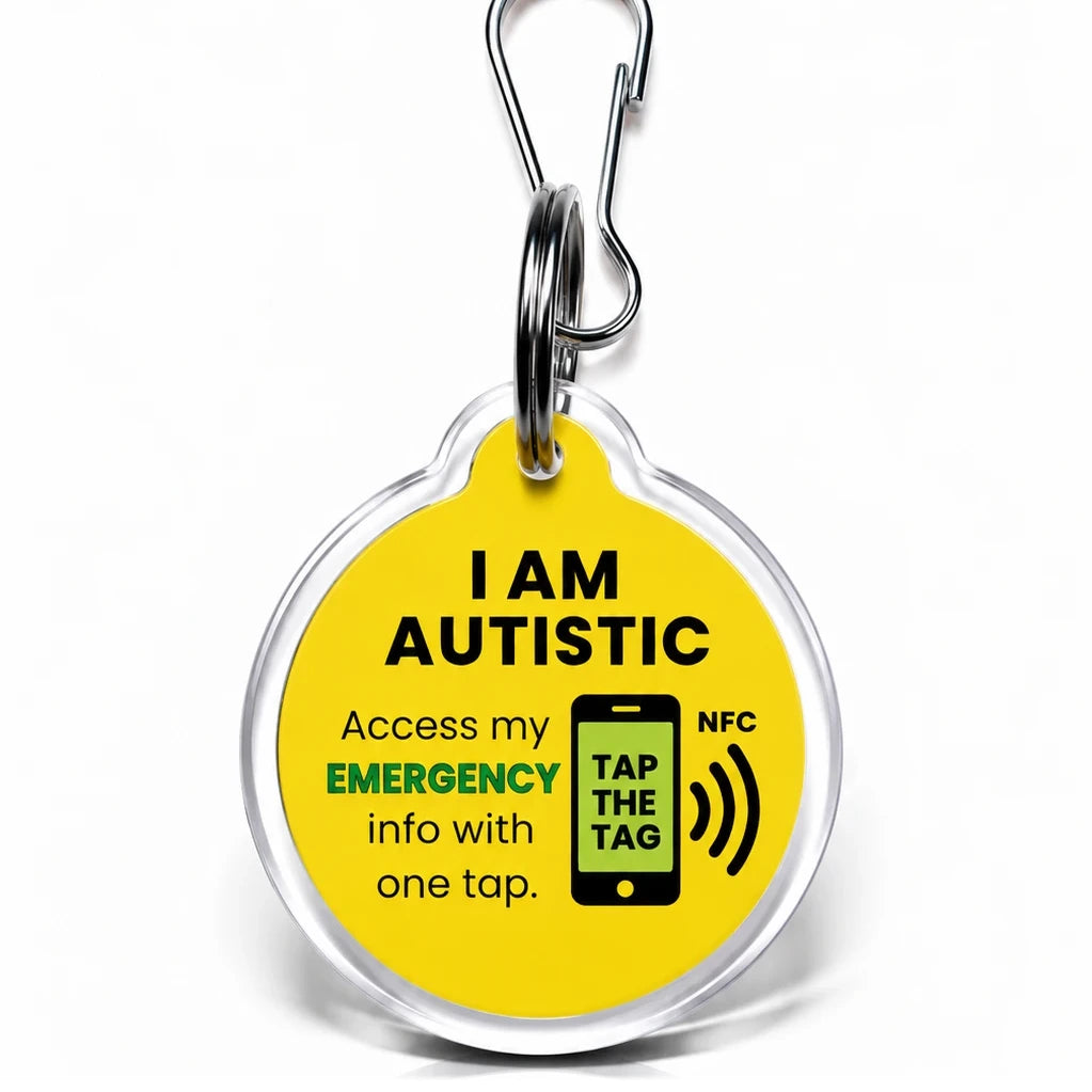 Yellow I Am Autistic NFC tag keyring. Tap with a smartphone to see communication needs and emergency contacts, no app needed